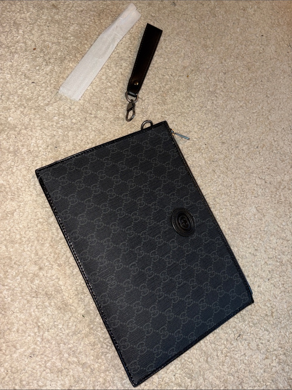 Designer Black Wrist Pouch - Embossed Logo